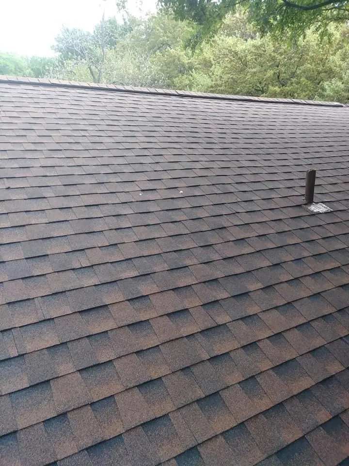 A roof with a chimney in Leander