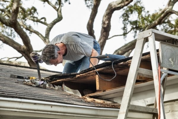 Man working on rooftop in Lakeway