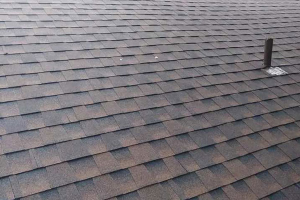 A close up of a roof with metal roofing