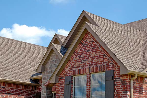 A close-up of a brick house in Pflugerville