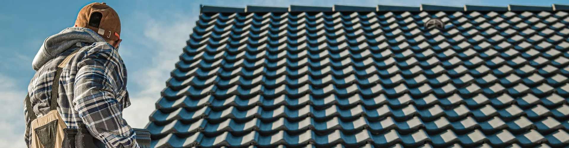 A close-up of a man looking up at roof in Taylor